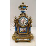 A Sevres clock urn mount on reeded feet