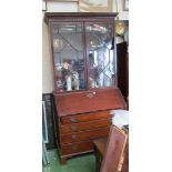 A Georgian mahogany bureau bookcase fitted interior