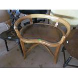 A carved oak spinning chair and a kidney shaped low back chair