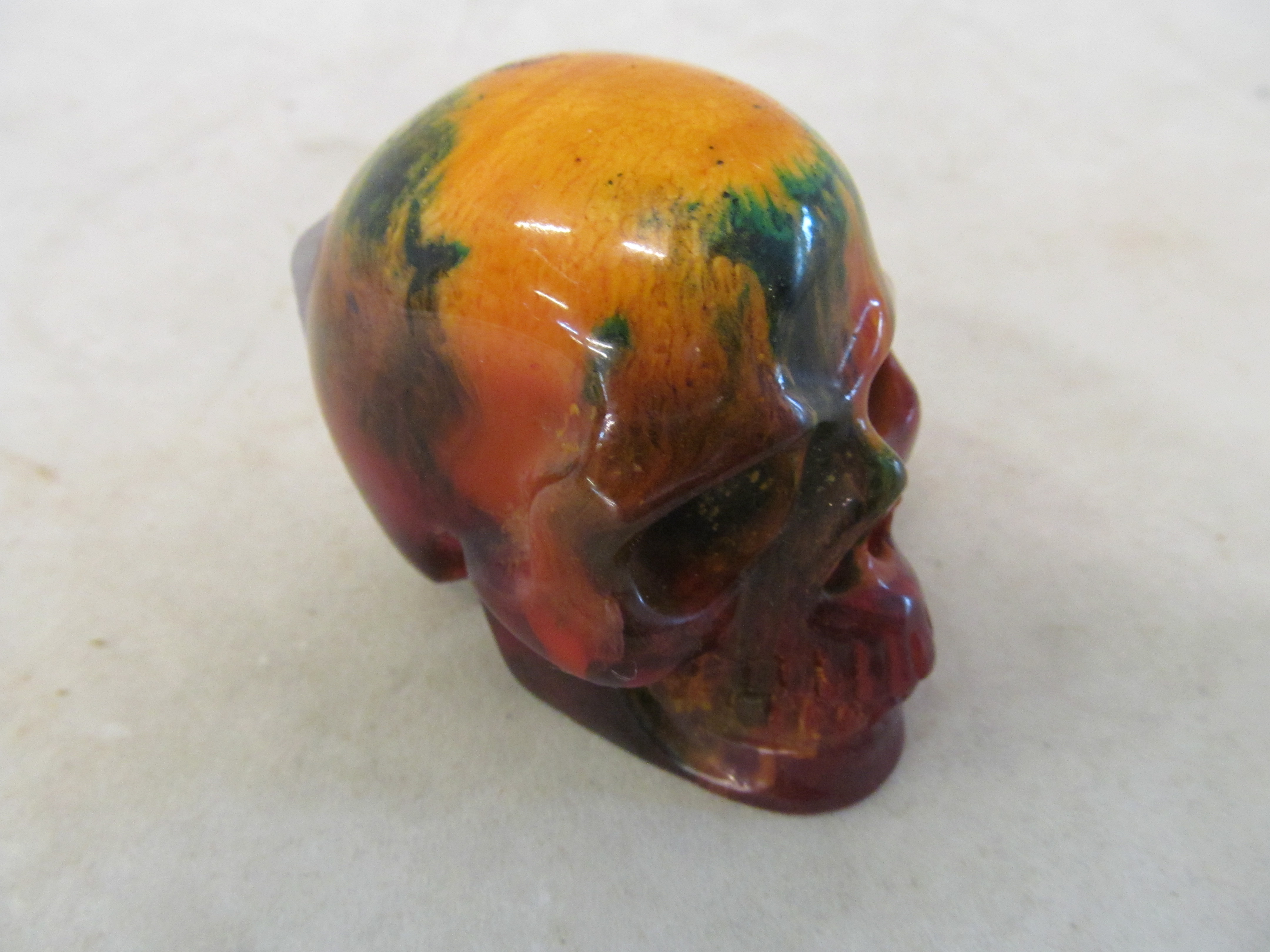 A small amber coloured skull
