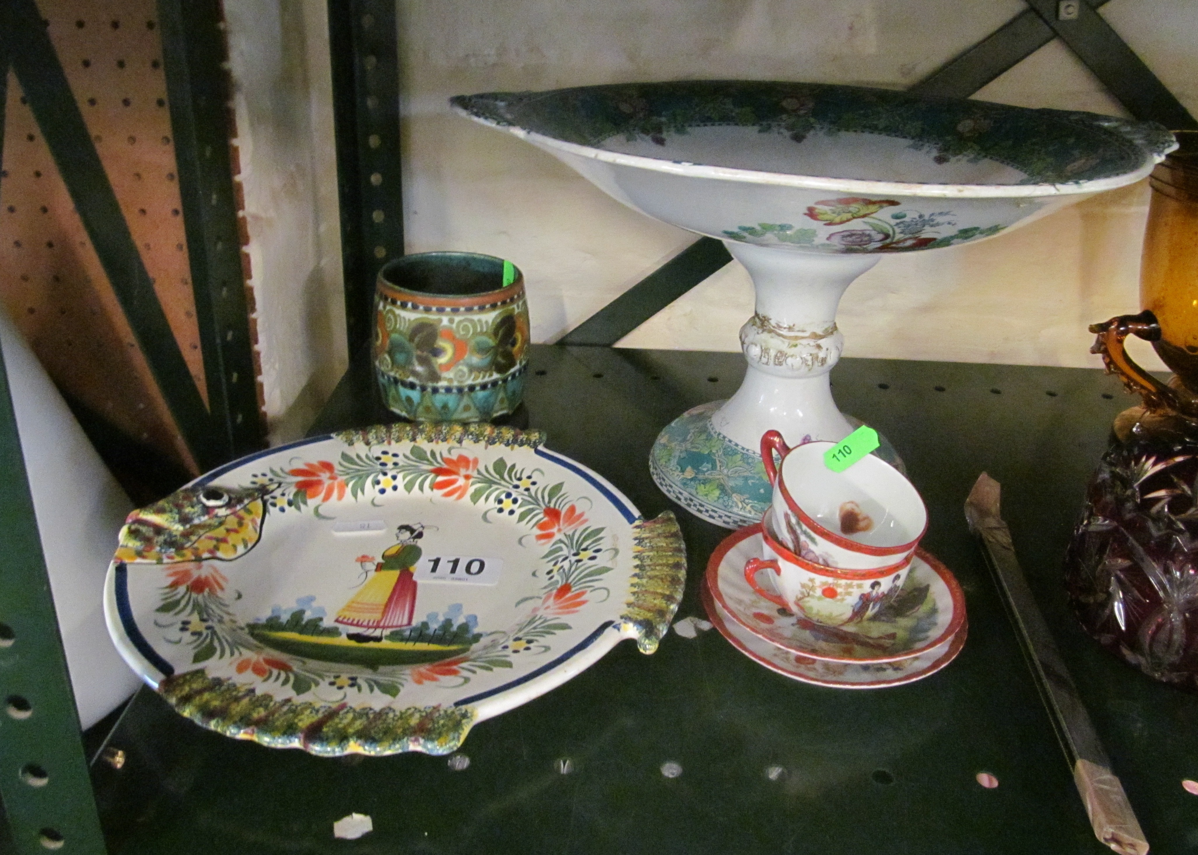 A Quimper plate, Gouda vase (a/f), two Oriental cups and saucers and centrepiece