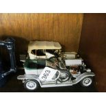 A Franklin Mint 1907 Rolls Royce Silver Ghost and 1911 Rolls Royce