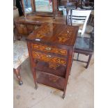 A 19th Century Continental inlaid trolley with flaps to top, two drawers and two shelves