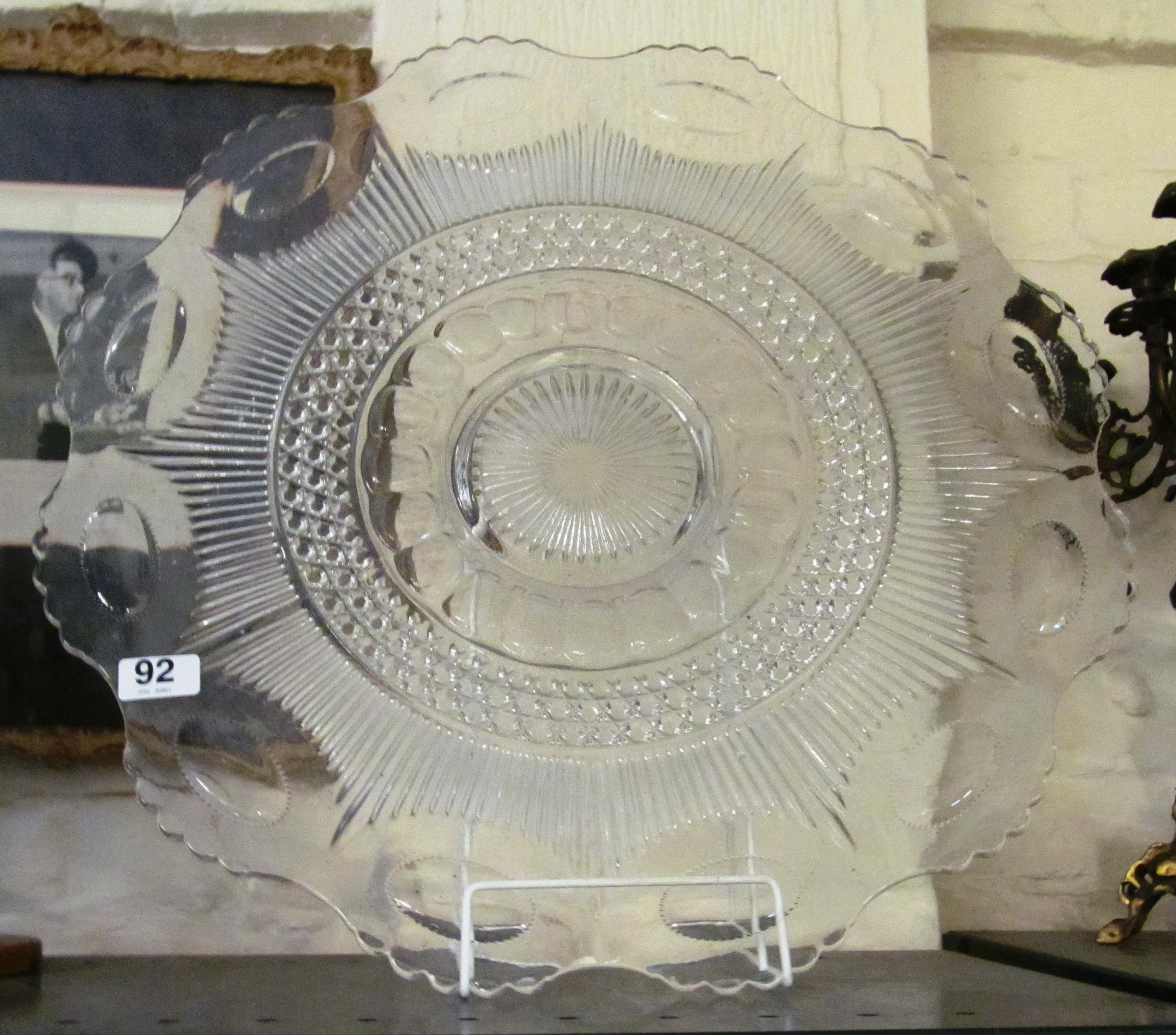 A large glass cake plate