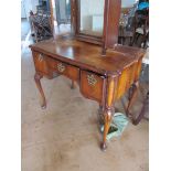 A walnut lowboy