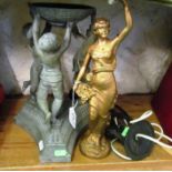 A modern stand held by cupids and a gilt classical lady and a lamp (a/f).
