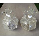 A pair of 19th Century Venetian two handled decanters with frilled