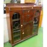 An oak bureau display cabinet