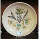 A Marianne de Trey studio pottery dish bird and flower design