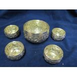 A silver bowl and four bowls