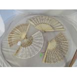 A mother of pearl and sequinned lacework fan and three similar fans
