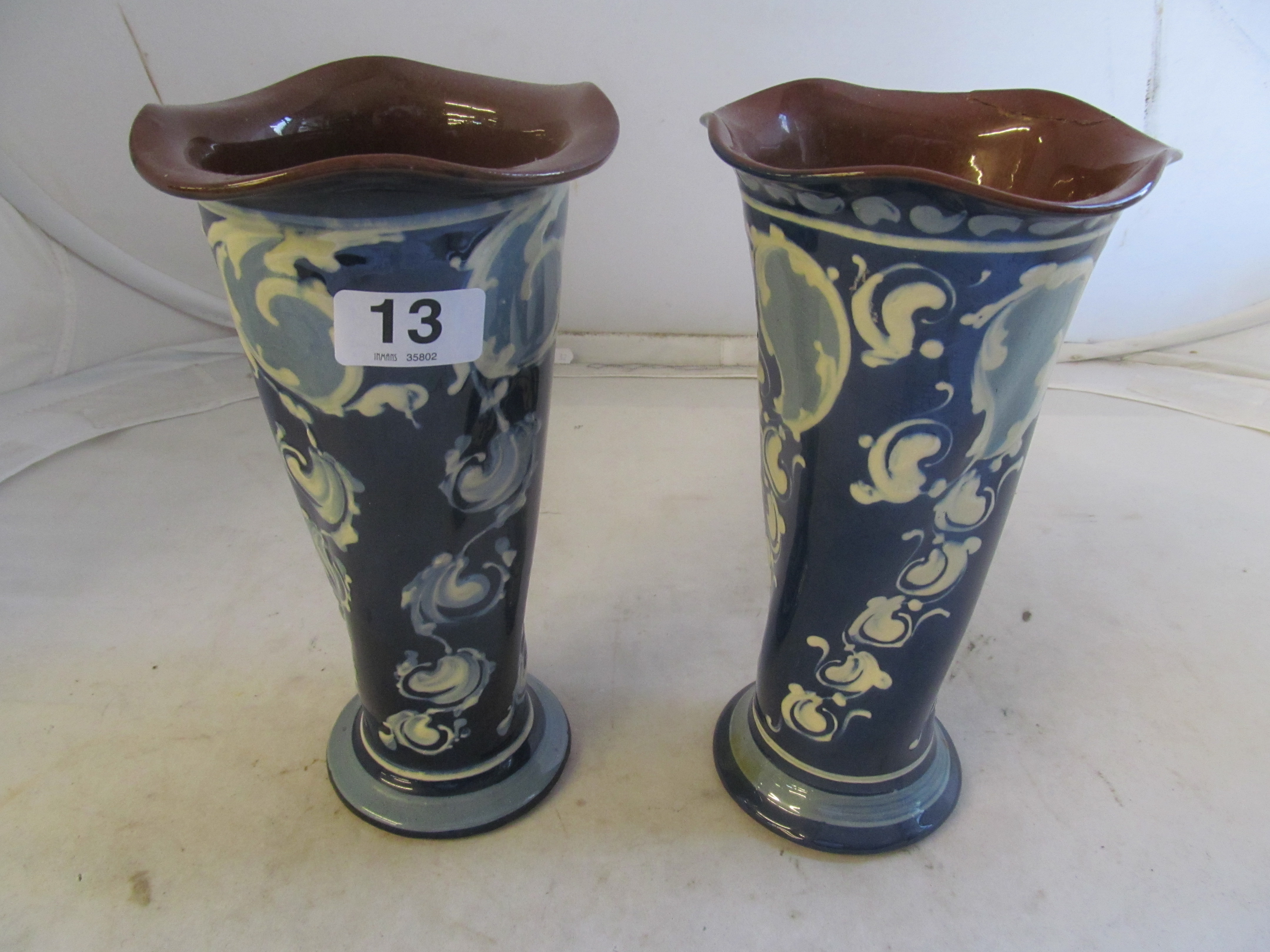A pair Torquay Pottery vases (one a/f).