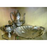 A silver-plated teaset and shell dish