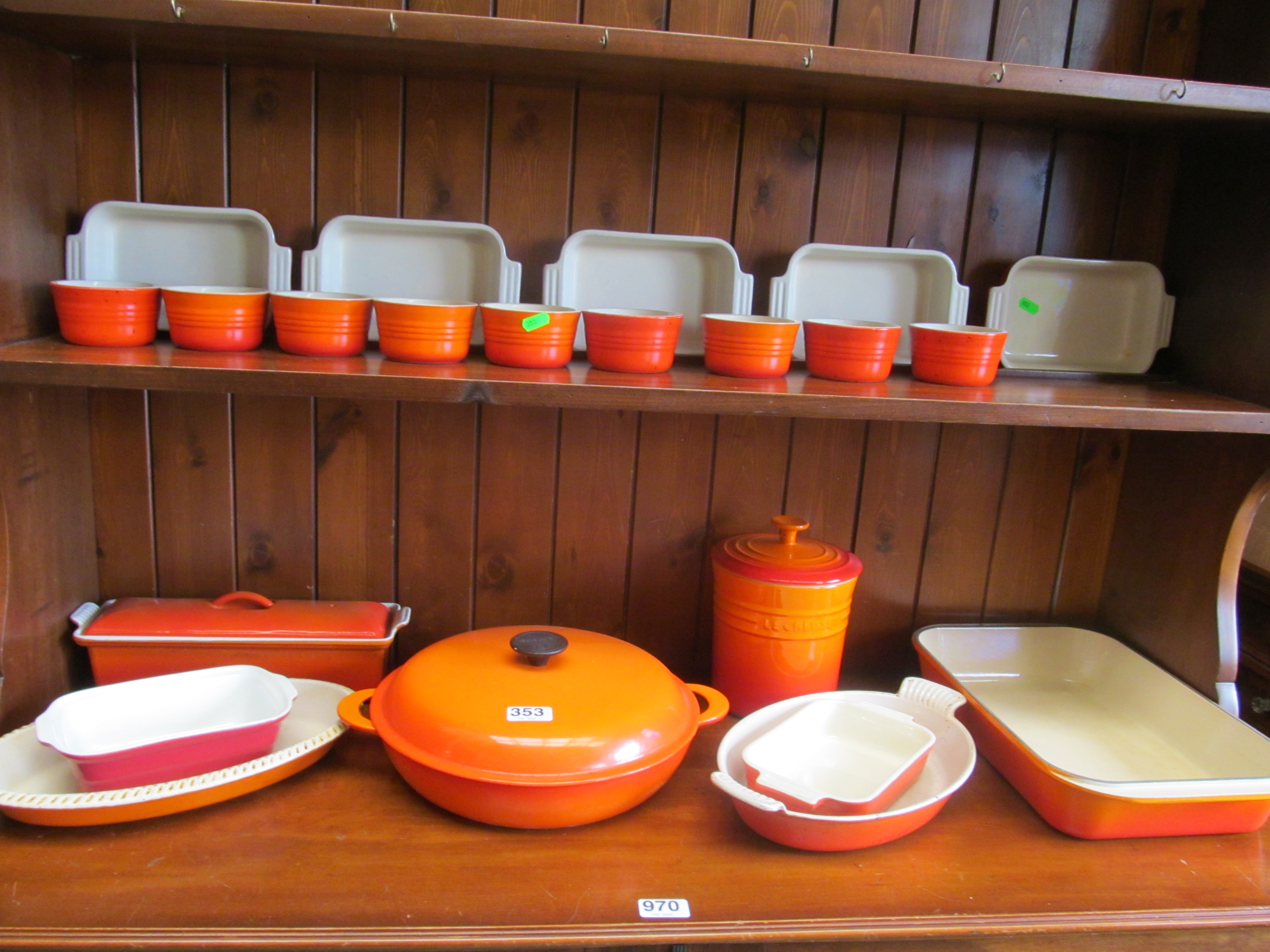 A Le Creuset lidded tureen and other Le Creuset kitchen ware