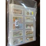 Eleven part sets of cigarette cards