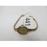 9ct gold excaliber ladies watch