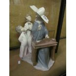 A Lladro 'Choir Lesson' No.4973 issued 1977 retired 1981.
