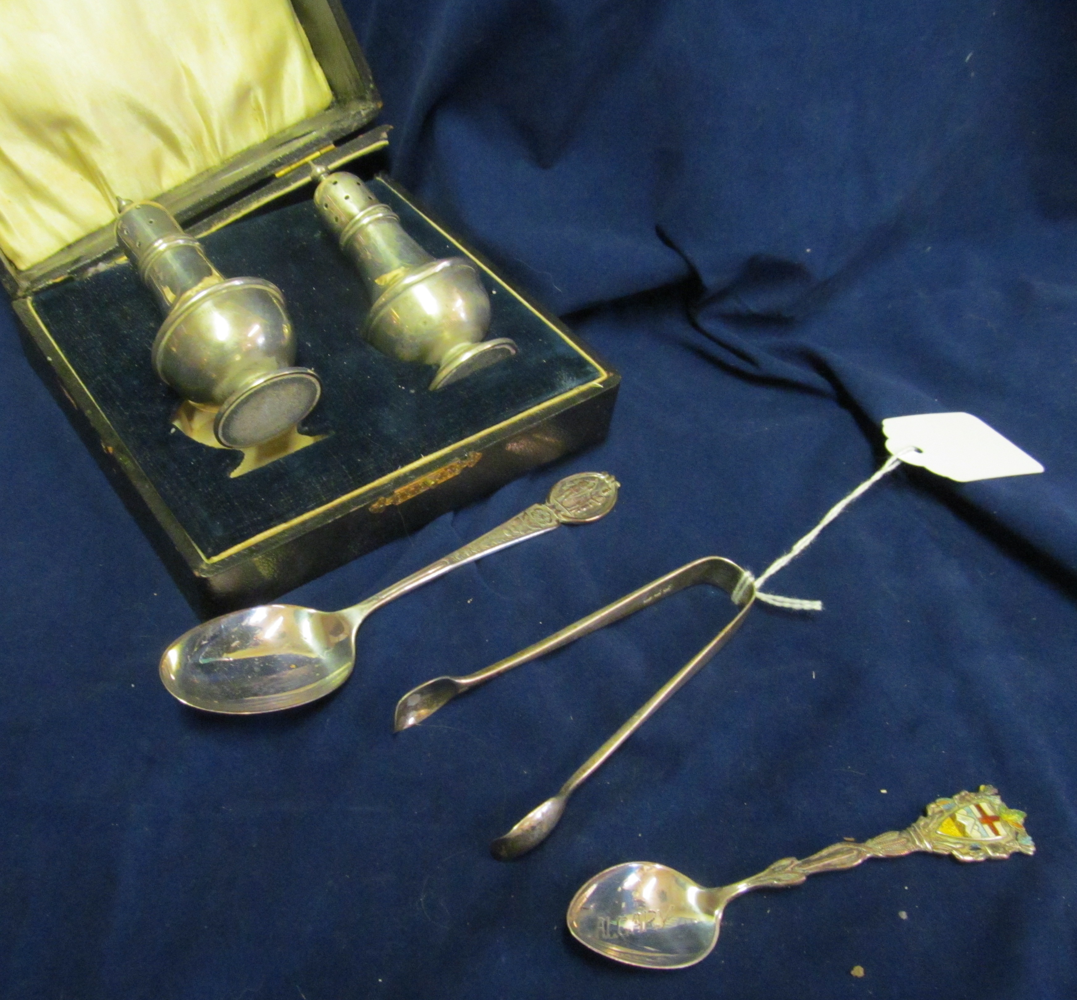 A pair of silver tongs, silver pepper and salt. and two spoons. - Image 2 of 2