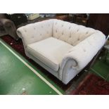 A chesterfield shape large armchair
