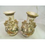 A pair oriental style vases (1 repaired)