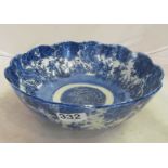 A transfer print blue and white bowl with frill border.
