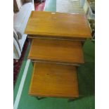 A nest of three Edwardian occasional tables and a single occasional table