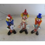 Three Murano clowns