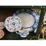 A blue and white platter, a plate and jug