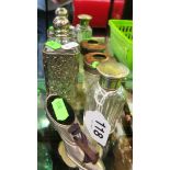 Two scent bottles, pin holder and a shoe pin cushion
