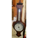 An Edwardian inlaid barometer.