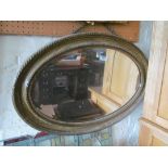 An oval mirror.