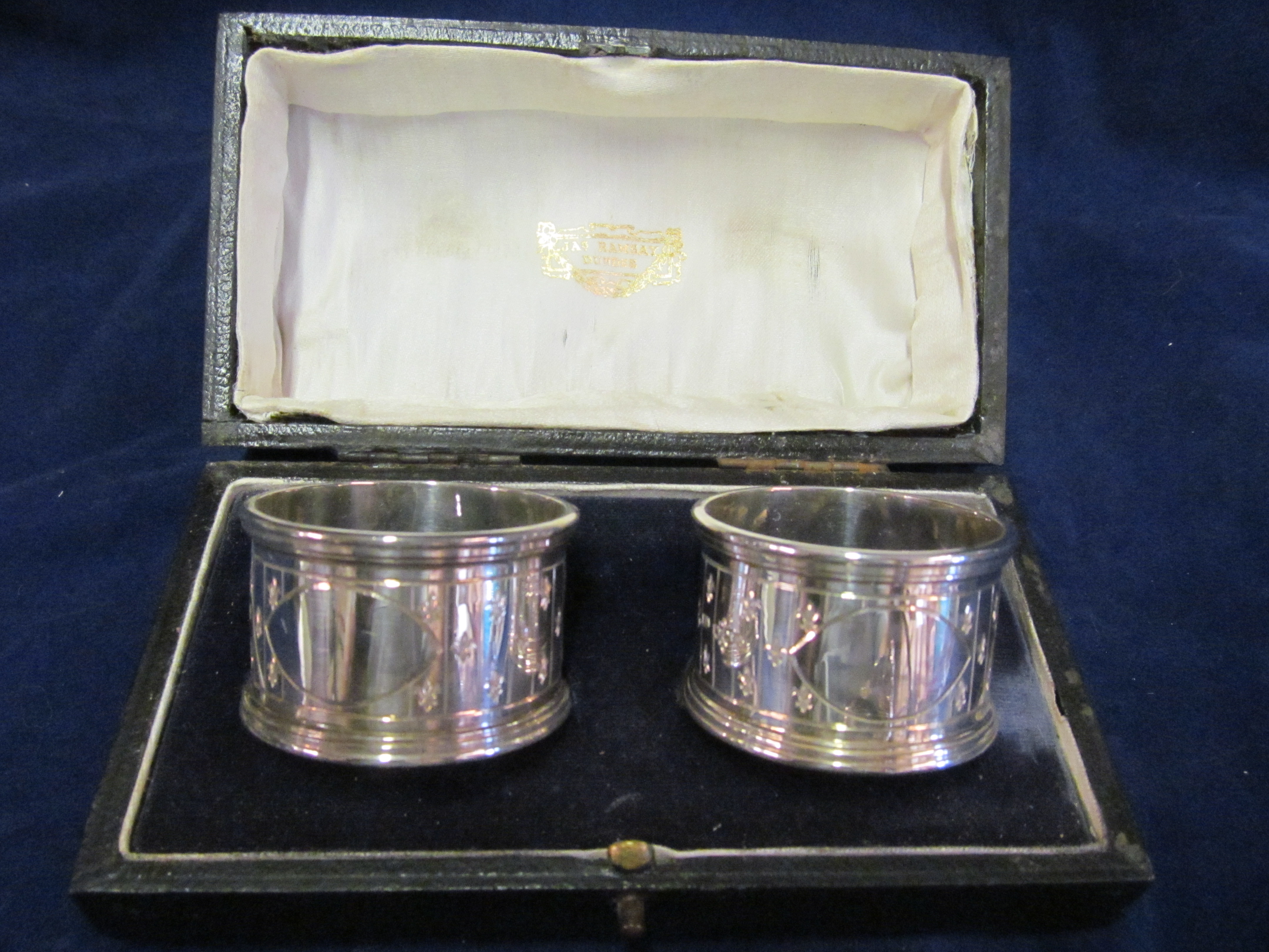 A pair Jas Ramsay napkin rings