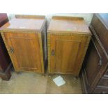 A pair of Art Deco walnut and banded bedside cabinets