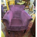 A chair with purple upholstery