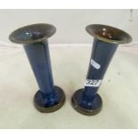 A pair of Royal Doulton blue glazed vases