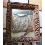 A carved wood mirror