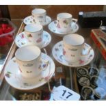 Five Derby coffee cups and saucers