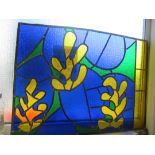 A modern stained glass panel a/f, other stained glass and glass to be cut