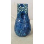A blue vase marked Liberty & Co. (s/a/f).