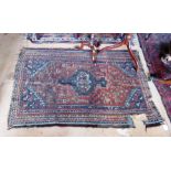Three Persian rugs (a/f).