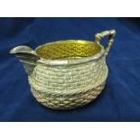 A Madras silver basket weave jug