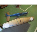 A precision model aeroplane with remote control and a glider