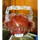 A Cranberry glass basket