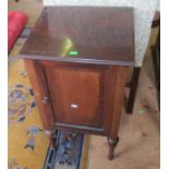 A mahogany dressing table and bedside cabinet