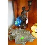 A spelter candleholder of a girl and a leaf dish with winged figure