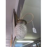 A glass pineapple ceiling light