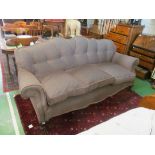 An early 20th Century settee with shaped back on cabriole legs, newly recovered.