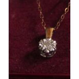A 9ct gold diamond pendant on chain.