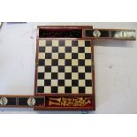 A chess set in marble effect box