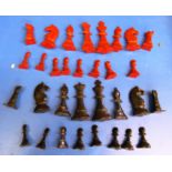 A set of painted metal chess pieces